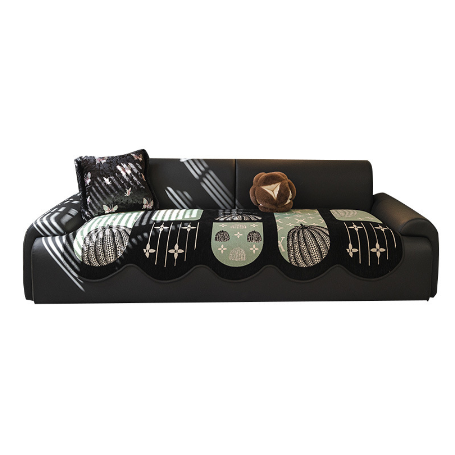 Chenille sofa rug with a botanical and floral pattern.