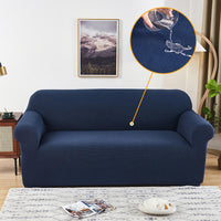 Sofa cover made of waterproof elastane material.