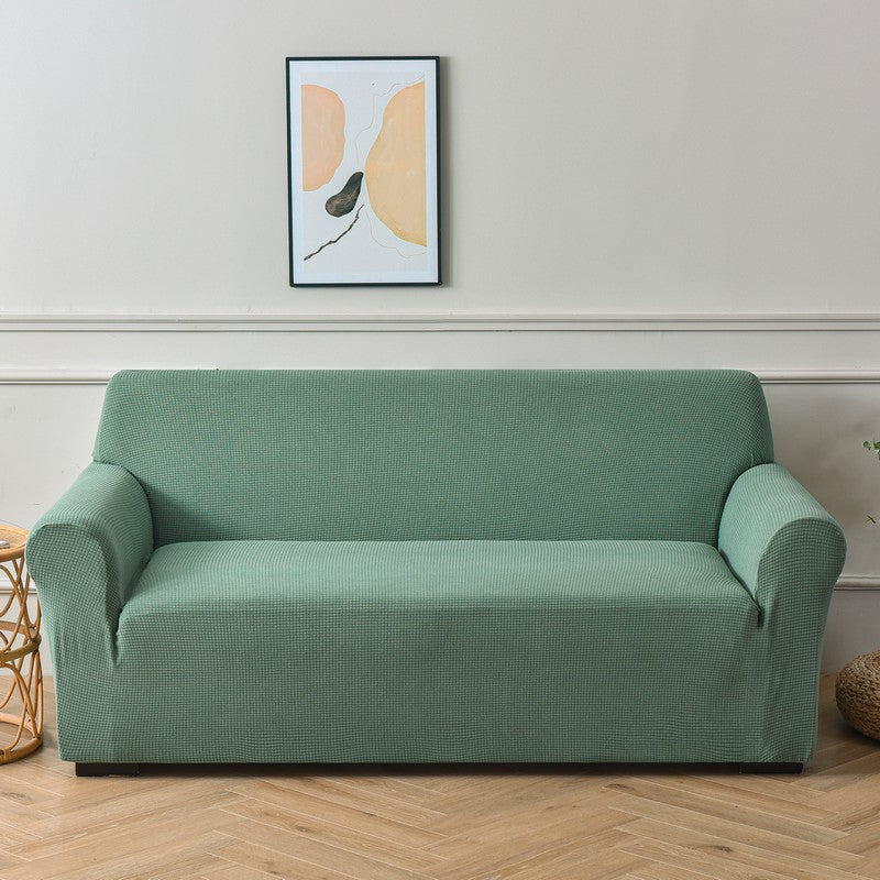 Sofa cover made of waterproof elastane material.