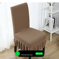 The chair cover has a skirt, is thick, stain-resistant, and elastic.