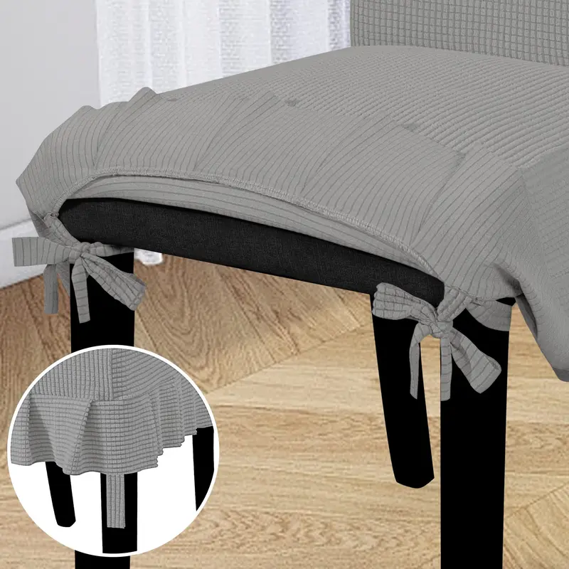 The chair cover has a skirt, is thick, stain-resistant, and elastic.